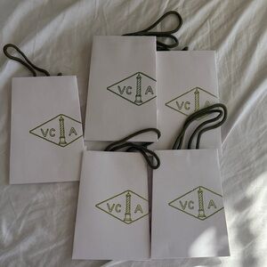 Van Cleef & Arpels White Bags with Green Logo